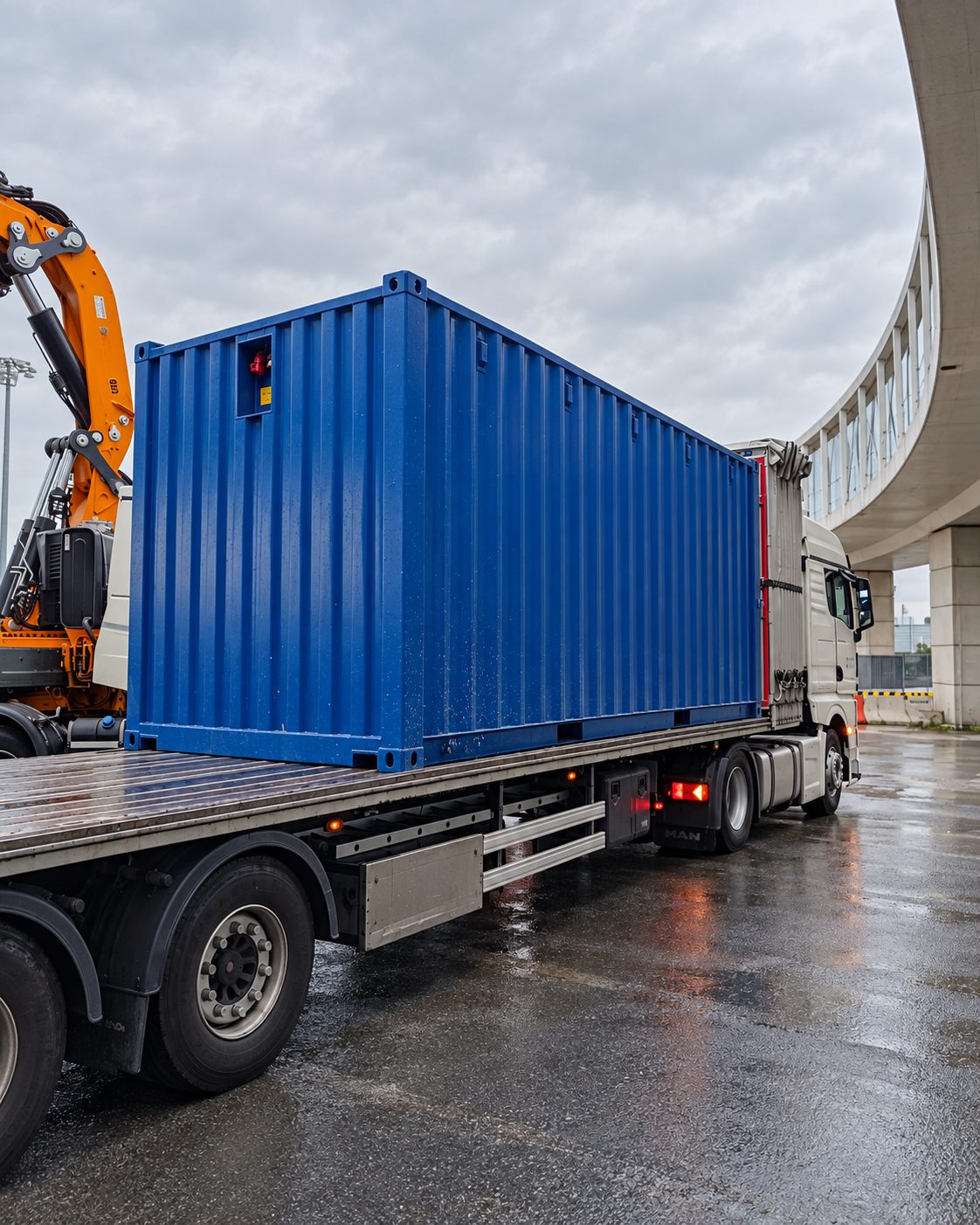 20ft container being loaded onto a container platform
