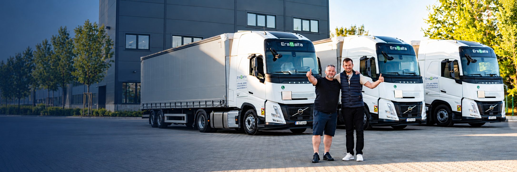 Careers at Erabalta: the team next to the company's trucks