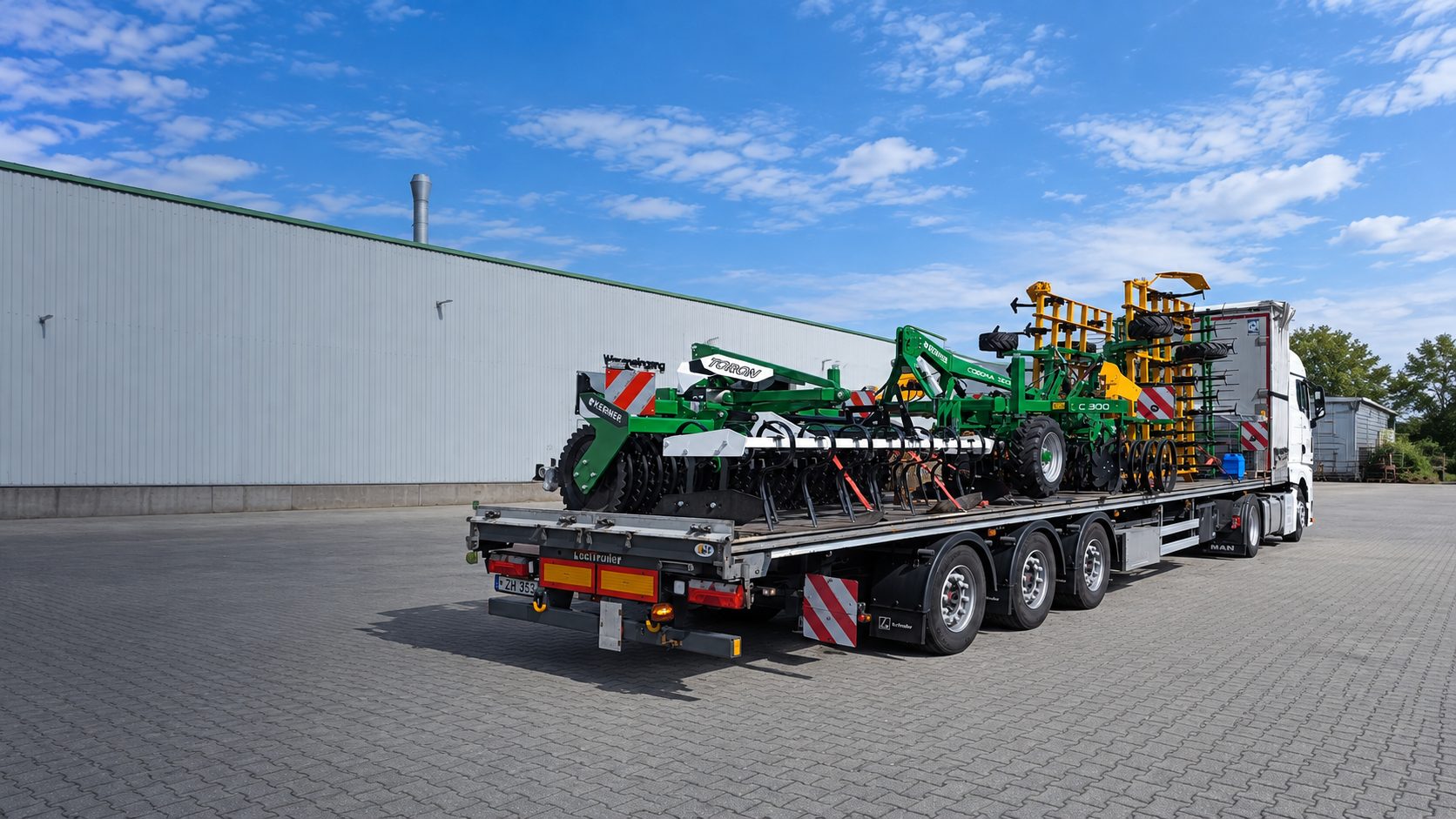 Agricultural machinery on a low-loader