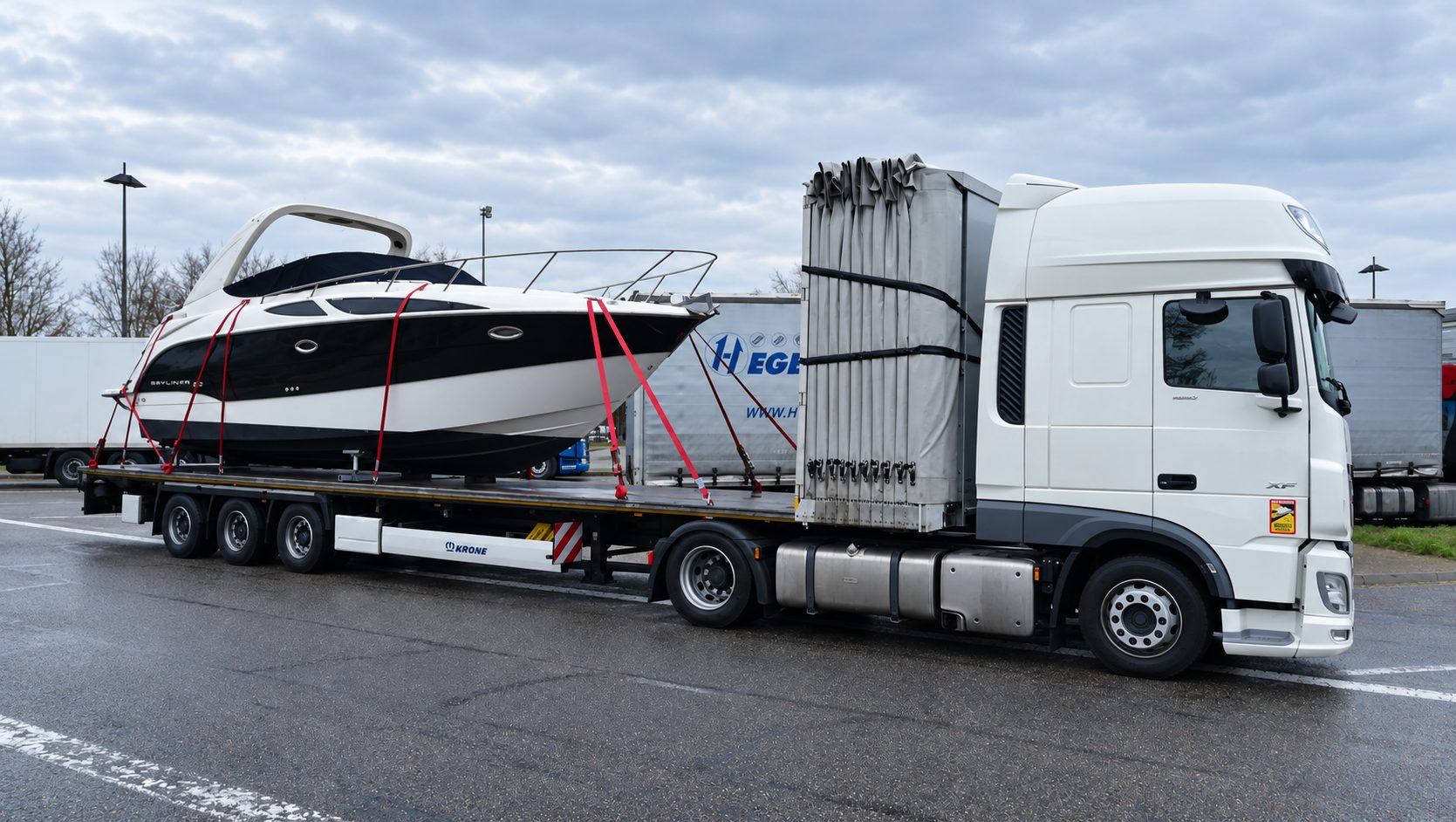 Yacht on an open flatbed semi-trailer